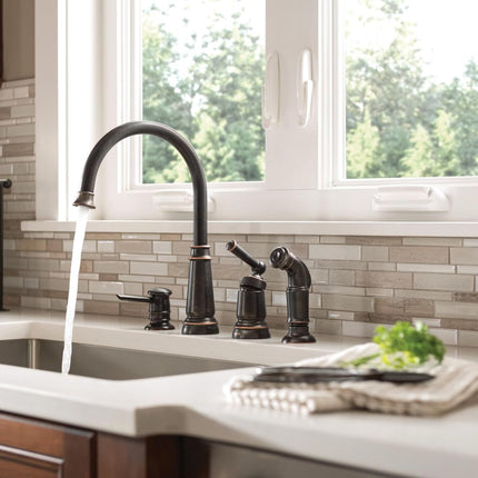 Moen 87042BRB Mediterranean Bronze One-Handle High-Arc Kitchen Faucet with Side Spray and Soap Dispenser, 4-Hole Installation